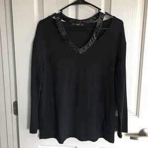 Bebe symmetric cutout neck blouse